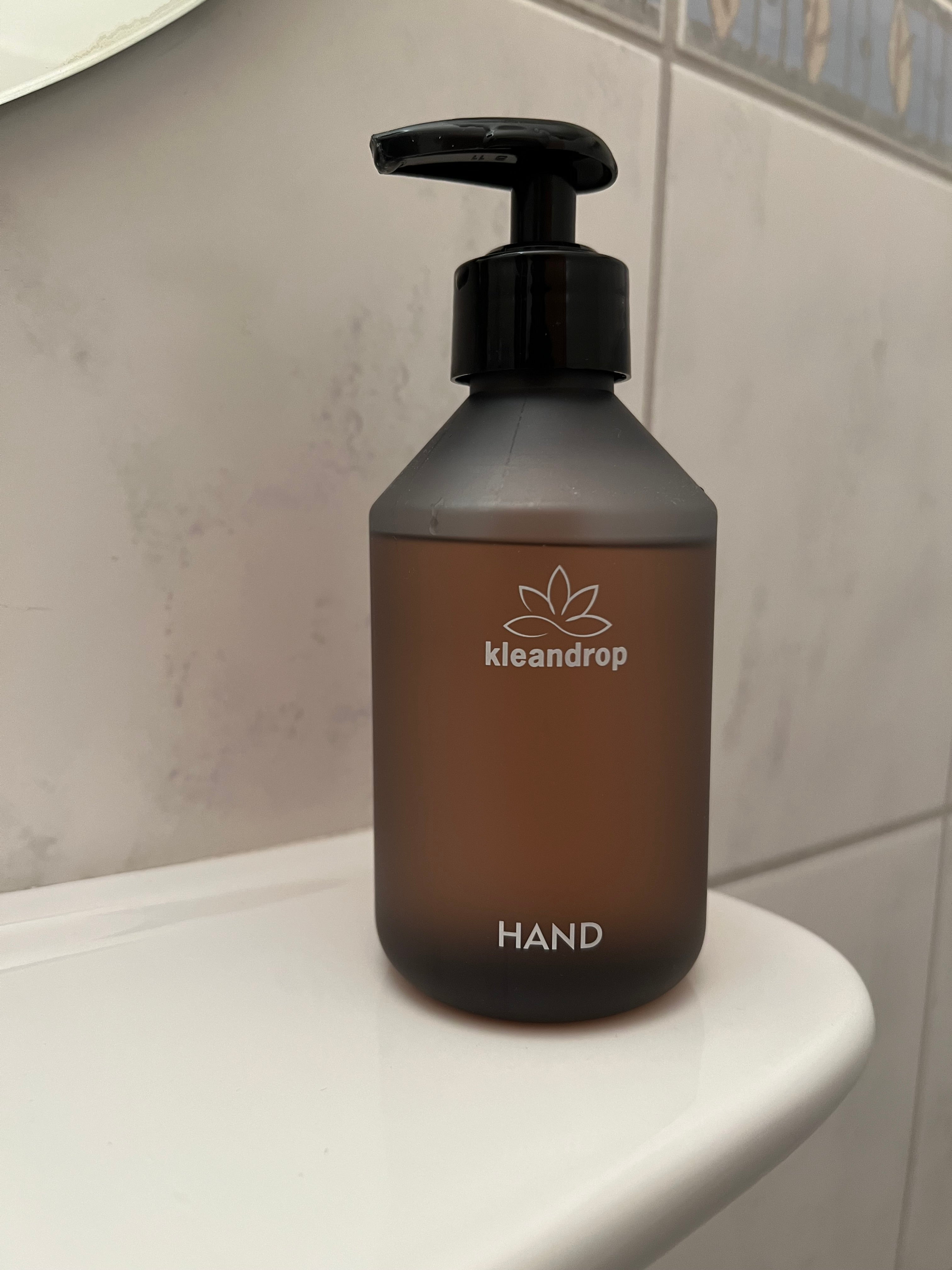 Dispenserflasche Hand